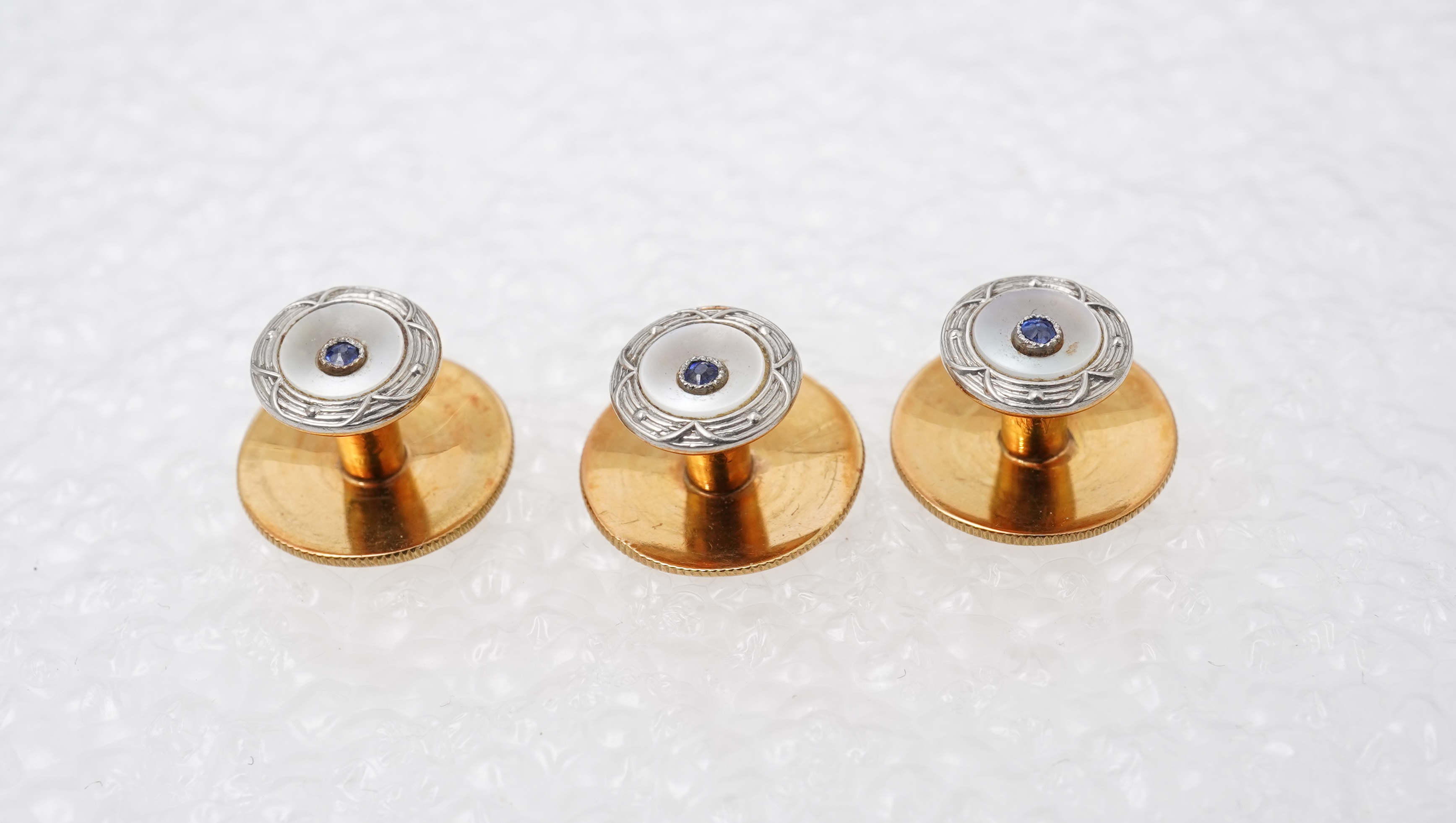 A collection of jewels and accessories, comprising: an onyx and diamond bar brooch, mounted in gold; a bangle set with a circular-cut diamond weighing approximately 0.07 carats, inner circumference approximately 17cm, st